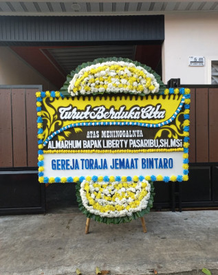 Papan Bunga Duka di Lokpaikat